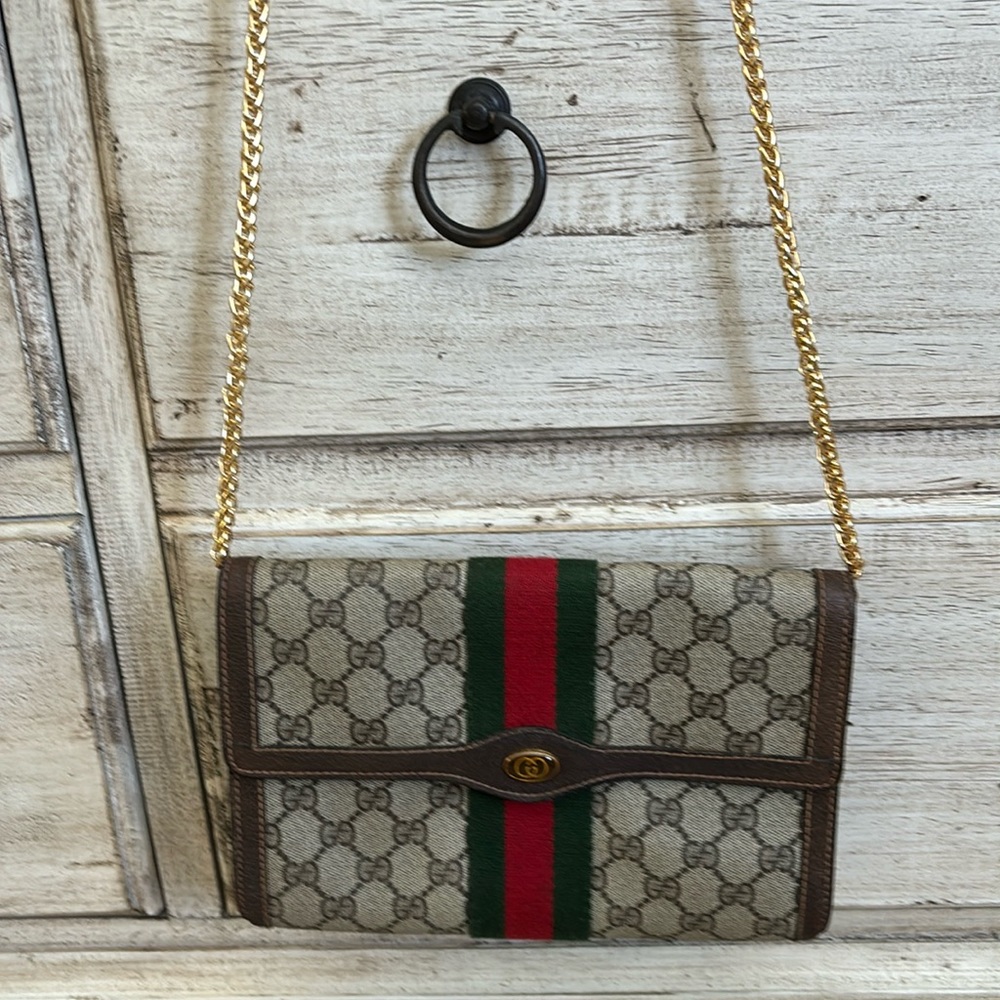 Authentic Gucci Ophidia GG Clutch in Good Condition